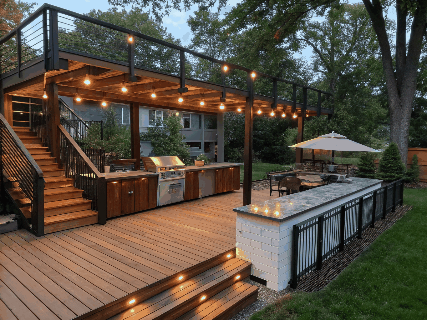 Custom composite multi-level deck and stone patio in Peachtree Corners