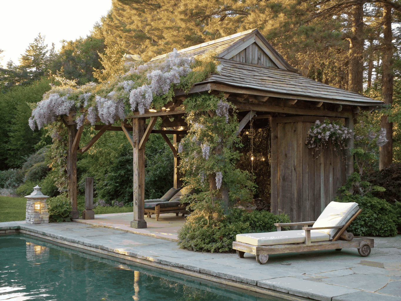 Poolside sheltered pavilion lounge with recessed architectural lights